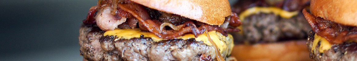Eating Burger at Colorado Grill restaurant in Clovis, CA.